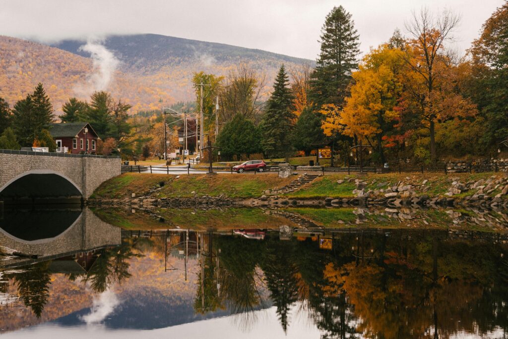 “Reliable Auto Movers truck delivering vehicles across New Hampshire.”